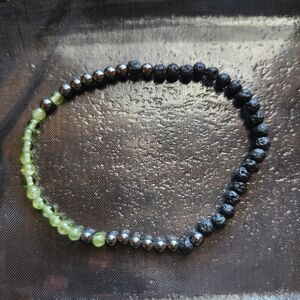 Peridot, Hematite, and Lava Beaded bracelet.